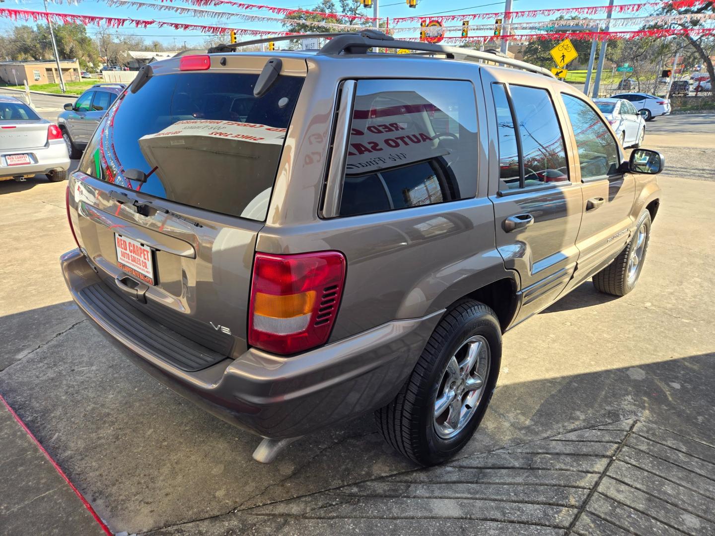 2001 PEWTER Jeep Grand Cherokee (1J4GX58N11C) with an 4.7L V8 F SOHC engine, Automatic transmission, located at 503 West Court, Seguin, TX, 78155, (830) 379-3373, 29.568621, -97.969803 - Photo#2